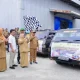 Bupati Kasmarni Lepas Penyaluran 489 Ton Beras Bantuan untuk 23.996 Keluarga.