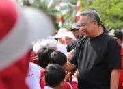 Semarak HUT ke-80 RI, Ribuan Warga Desa Marga Mulya Bersama Bupati Rohul Ikuti Senam Sehat dan Jalan Santai