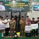 Bupati Kampar Serahkan Santunan Rp42 Juta untuk Pekerja Sawit, Bukti Nyata Program DBH Sawit