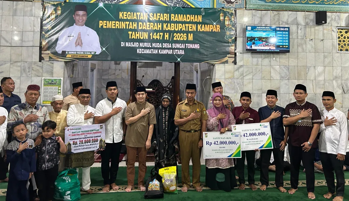 Bupati Kampar Serahkan Santunan Rp42 Juta untuk Pekerja Sawit, Bukti Nyata Program DBH Sawit