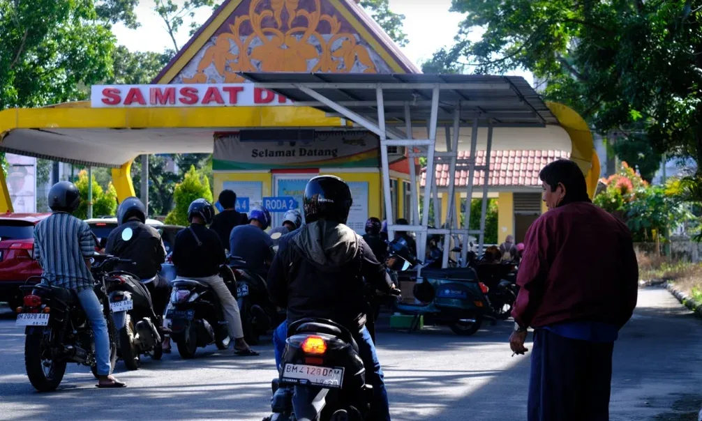 Pelayanan Bapenda Riau Raih Predikat Sangat Baik